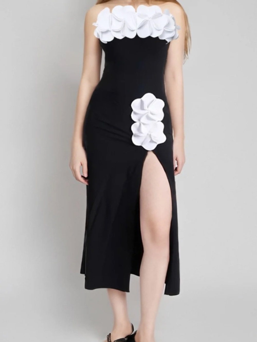 Black swimsuit and skirt embellished  with white flowers, size large